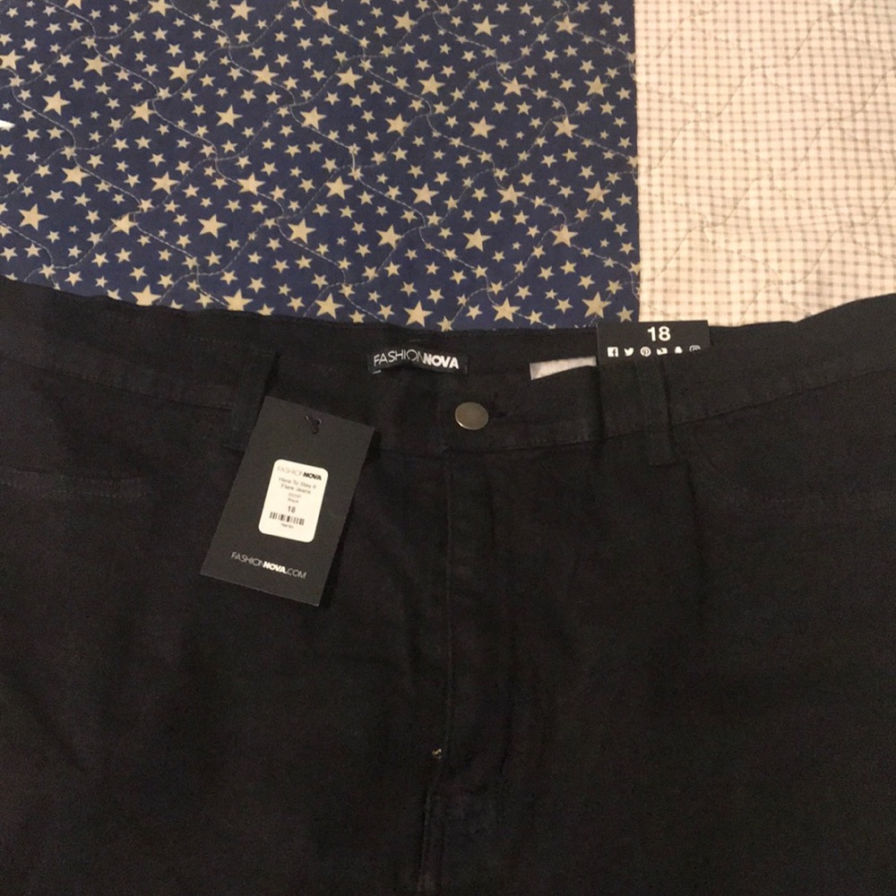 High waisted black stretchy jeans